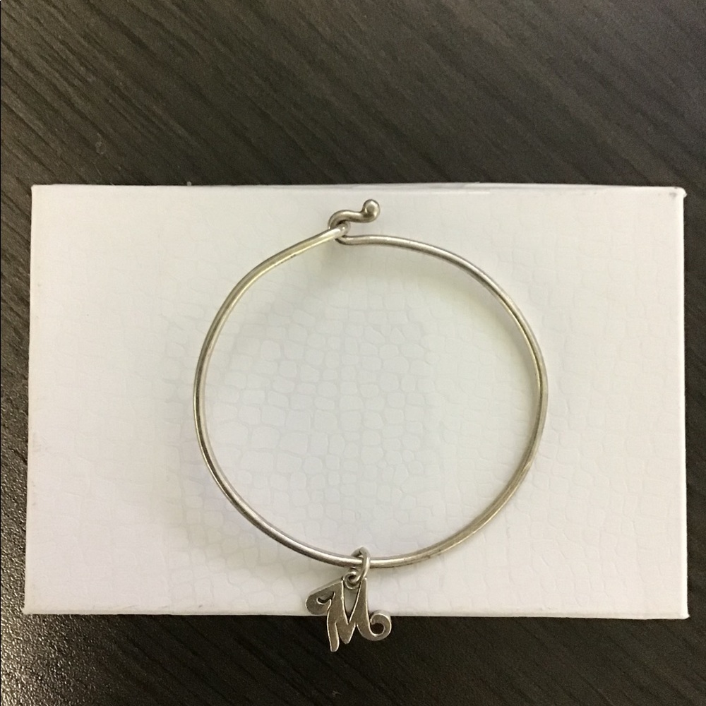 James Avery hook on charm bracelet with charm
